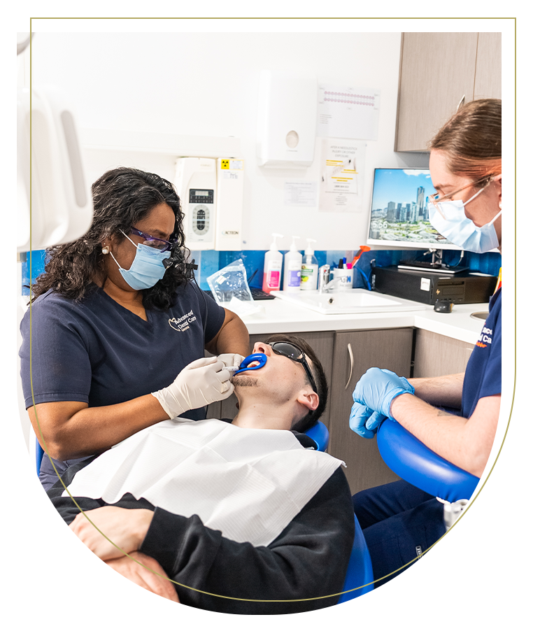 A happy patient showing off their transformed smile after a composite veneer procedure at Advanced Dental Care Dubbo.