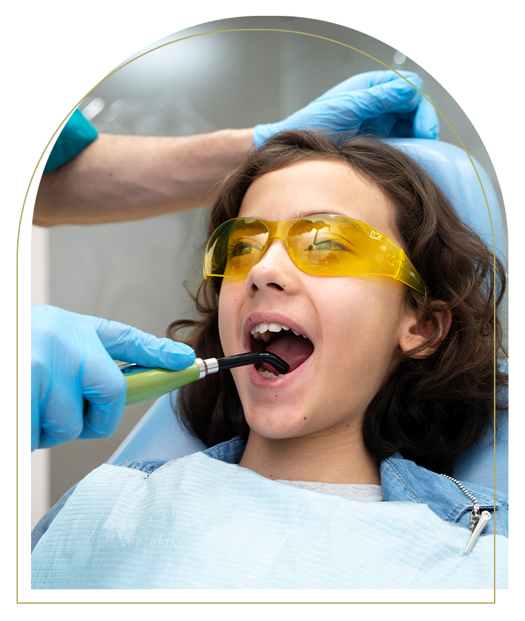 Child receiving dental treatment at Advanced Dental Care Dubbo for kids dentistry.